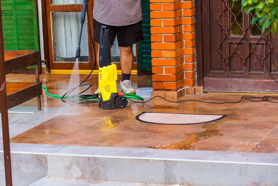 Pressure washing commercial patio