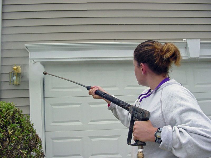 Power washing a garage door